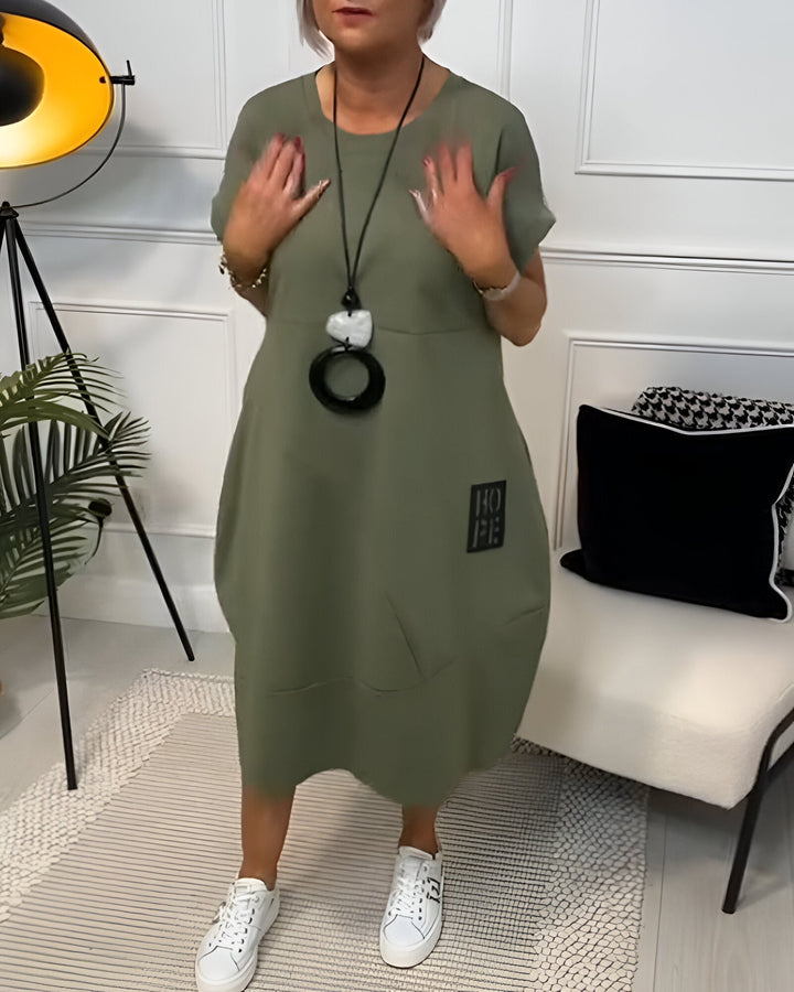 Grażyna | Sukienka midi z unikatowym detalem „HOPE”