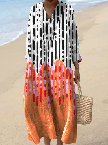 Nela | Sukienka midi z abstrakcyjnymi i kwiatowymi nadrukami