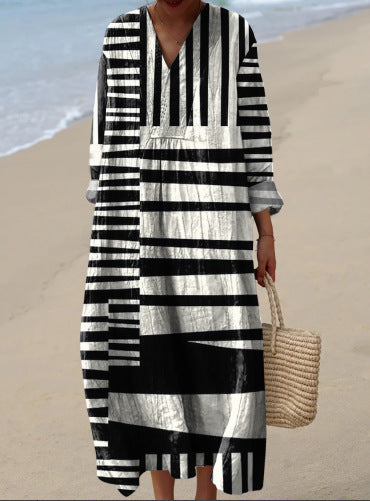 Nela | Sukienka midi z abstrakcyjnymi i kwiatowymi nadrukami