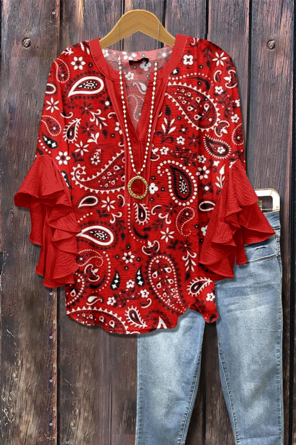 Fiołka | Bluzka w kwiatowy wzór z falbanowymi rękawami i kobiecym krojem