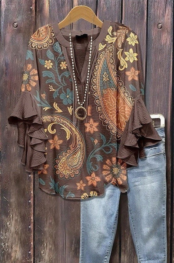 Fiołka | Bluzka w kwiatowy wzór z falbanowymi rękawami i kobiecym krojem