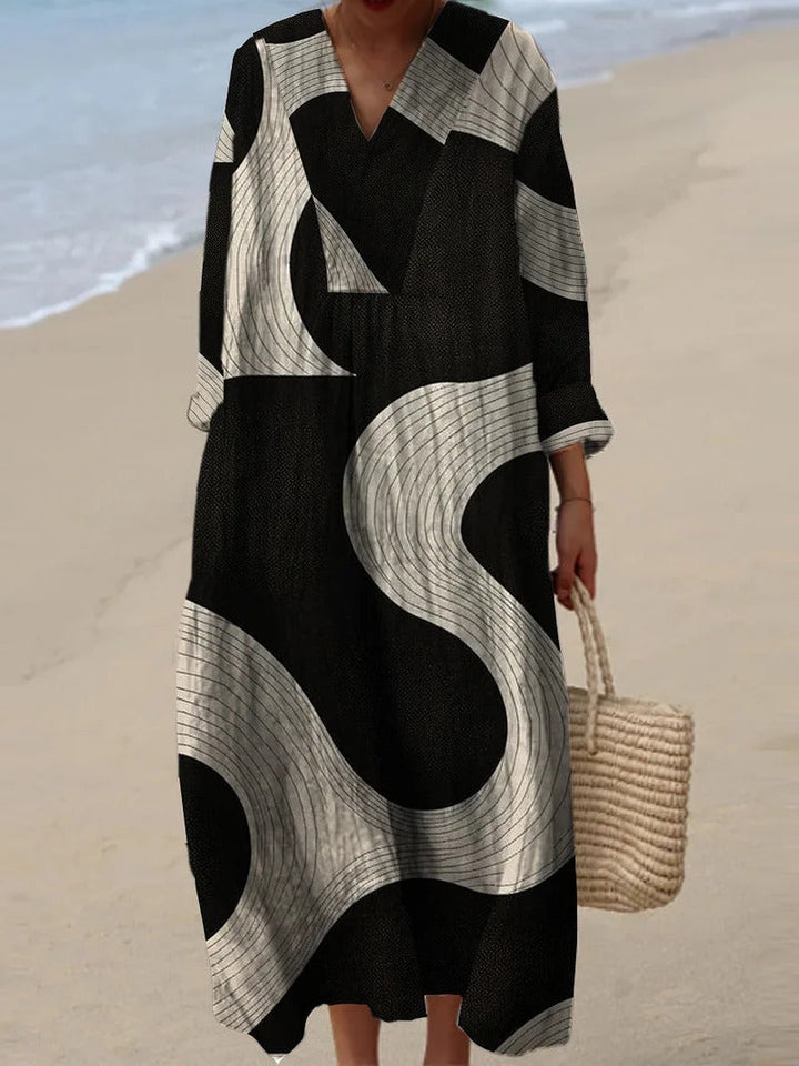 Nela | Sukienka midi z abstrakcyjnymi i kwiatowymi nadrukami