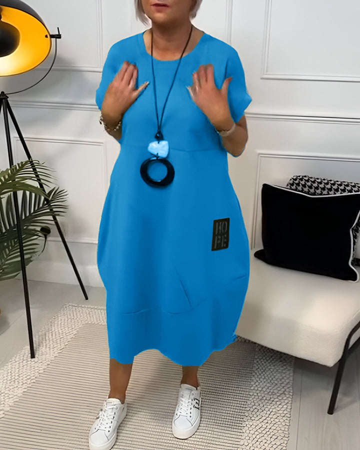 Grażyna | Sukienka midi z unikatowym detalem „HOPE”