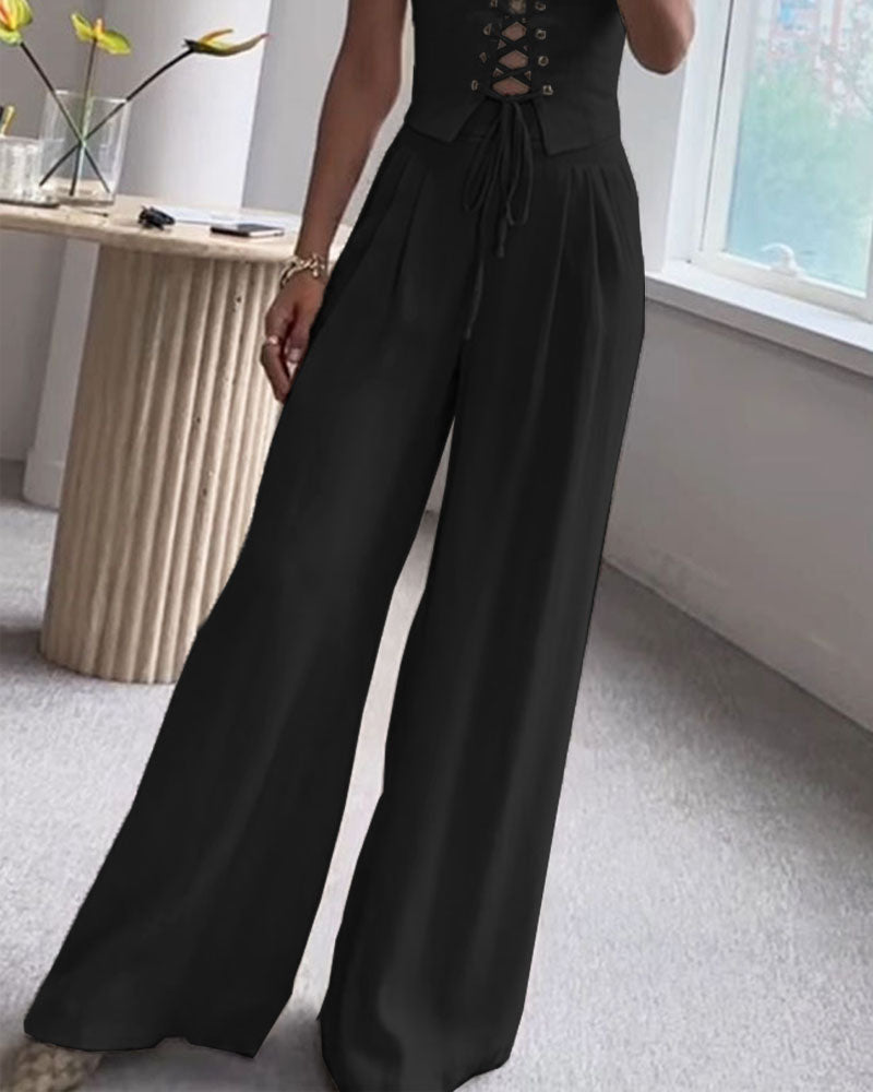 Natasza | Dopasowany top inspirowany gorsetem i plisowane spodnie – komplet