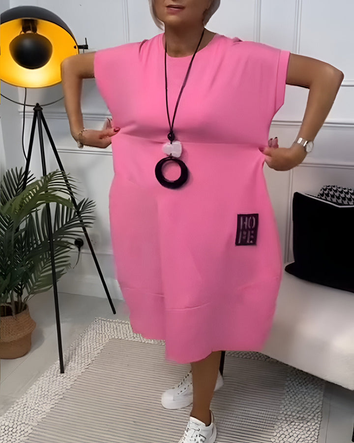 Grażyna | Sukienka midi z unikatowym detalem „HOPE”