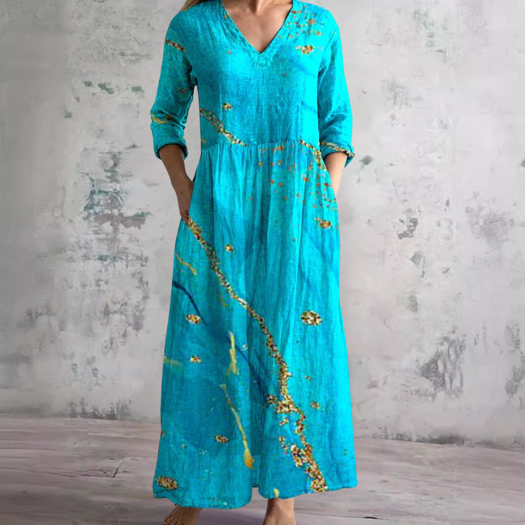 Milena | Sukienka w kwiaty z dekoltem V i delikatnym drapowaniem